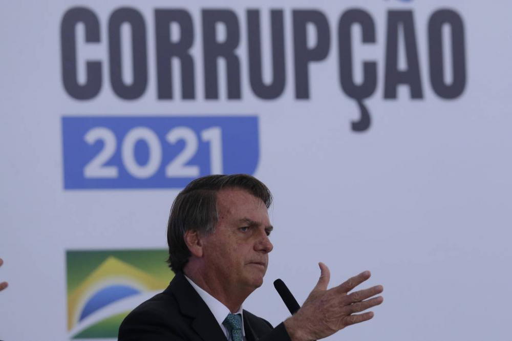 O presidente Jair Bolsonaro (sem partido) durante cerimônia no Palácio do Planalto, em Brasília - Lucio Tavora - 9.dez.21